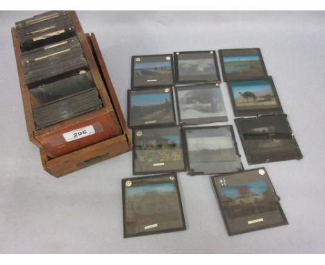 Quantity of World War I magic lantern slides housed in a wooden box