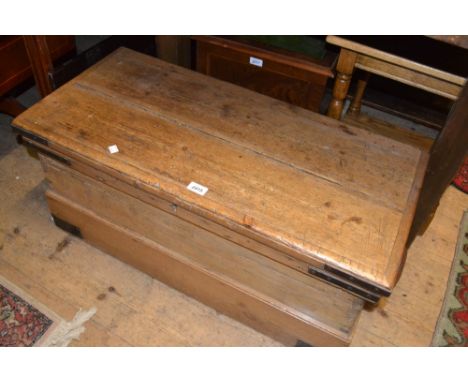 19th Century heavy polished pine iron mounted ship's trunk with hinged cover and plinth base