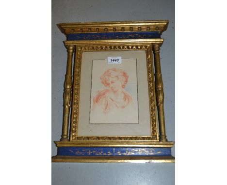 Sepia crayon drawing, head and shoulder portrait of a young man housed in a carved gilded and painted Florentine style frame,