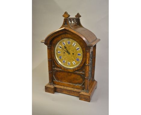 Victorian pollard oak bracket clock, the Gothic design case with a pierced surmount and tracery door flanked by cluster colum