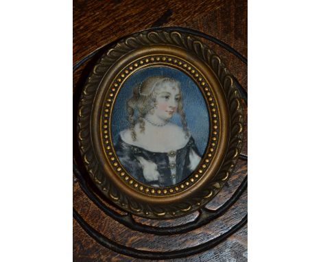 Antique oval miniature portrait of an 18th Century lady in a black tunic