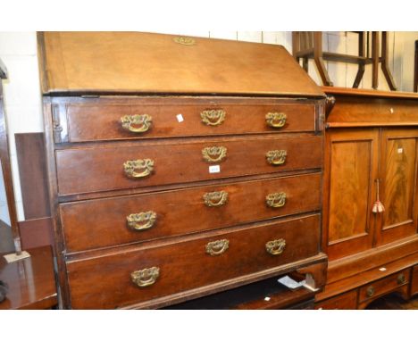 George III mahogany bureau with a fall front enclosing a fitted interior over four graduated drawers with bracket feet CONDIT