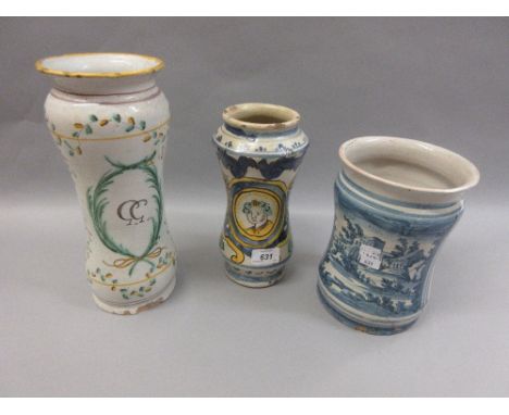 Italian Majolica polychrome Albarello decorated with a portrait together with another decorated in blue and white with landsc