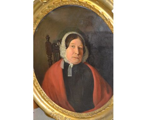 19th Century English school, oil on canvas, half length portrait of a lady wearing a lace bonnet and red shawl, in oval gilde