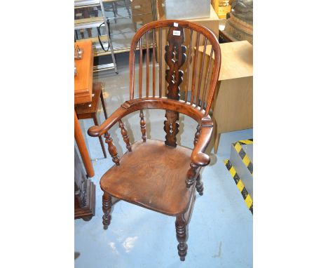 19th Century yew and elm Windsor chair, the tall hoop, stick and pierced splat back above shaped arms with baluster turned up