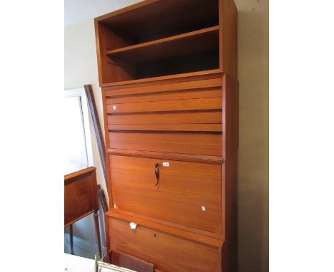 Mid 20th Century Ladderax type teak wall shelf unit comprising: various cabinets and shelves including sliding door and drop 