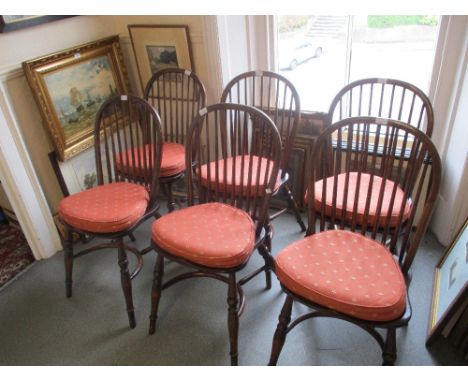 Good quality reproduction oak circular extending pedestal dining table together with a set of six hoop and stick back chairs 