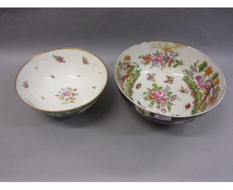 Large Samson Worcester punch bowl (at fault) together with a similar bowl decorated with exotic birds and flowers on a green 
