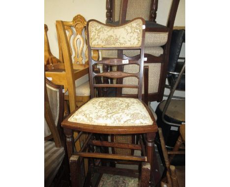 Edwardian mahogany and marquetry inlaid ladder back bedroom chair with a padded top rail and seat on turned supports