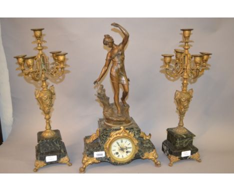 19th Century French patinated spelter and green flecked marble clock garniture, the clock surmounted by a figure of Flore, th