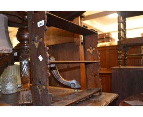 Victorian three shelf open wall bracket, together with an Edwardian mahogany mirror back and shelved wall bracket