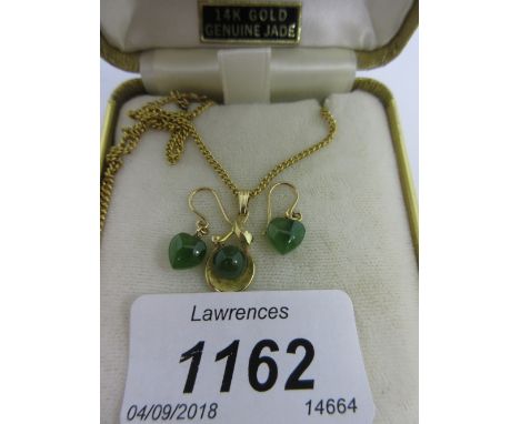 14ct Gold mounted jade pendant on a 9ct gold chain, together with a pair of jade heart shaped drop earrings