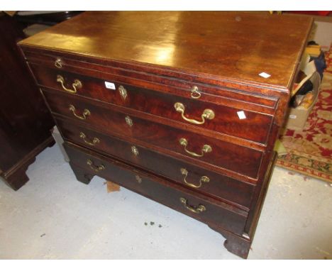 George III mahogany dwarf chest, the moulded top with brushing slide above four graduated drawers with brass swan neck handle