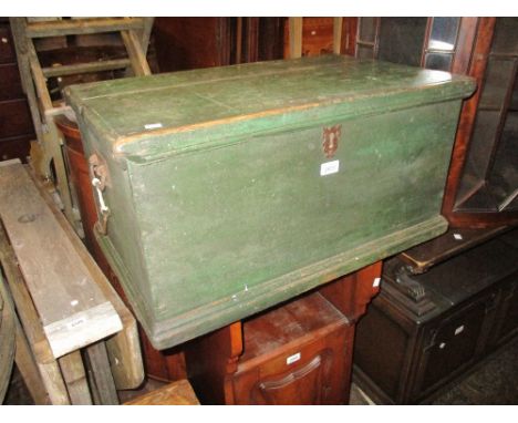 19th Century green painted trunk with hinged cover and iron end handles