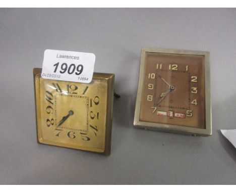 Jaeger-LeCoultre small travel clock with calendar apertures (for restoration), together with another Swiss gilt metal travel 