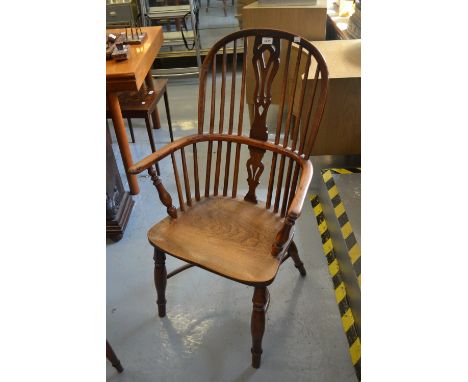 18th / 19th Century yew and elm Windsor chair, the tall hoop, stick and pierced splat back above a carved panel seat, turned 