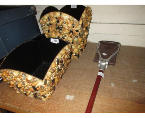 Two shell encrusted jardinieres and a shooting stick