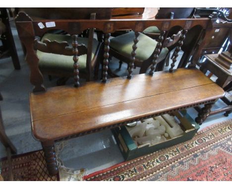 Victorian oak hall bench with bobbin turned back above a plank seat and bobbin turned supports