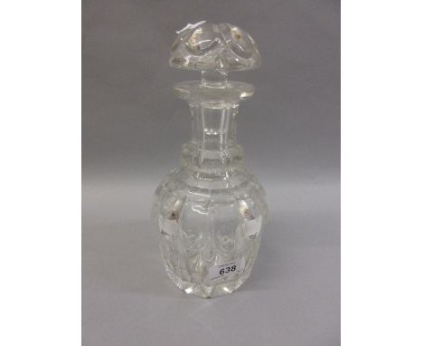 Late Regency glass decanter, the mushroom stopper above a lobed and facet body and star cut base