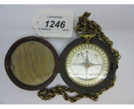 19th Century gilt metal cased compass with silvered dial in original leather case with a brass guard chain