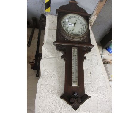 Late Victorian carved oak aneroid barometer / thermometer