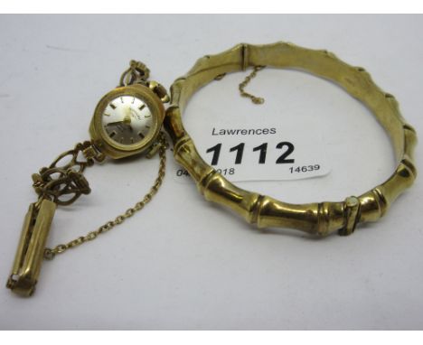 9ct Gold bamboo effect bangle together with a ladies 9ct gold cased Rotary wristwatch with a bracelet strap