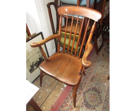 19th Century elm and beech stick back elbow chair on turned supports