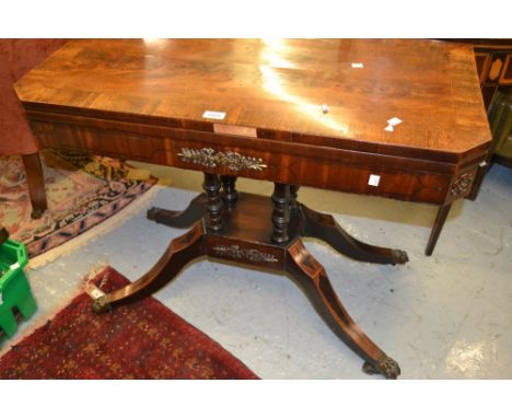 Regency mahogany black line inlaid and ormolu mounted fold-over card table, raised on four turned supports with quadruped bas