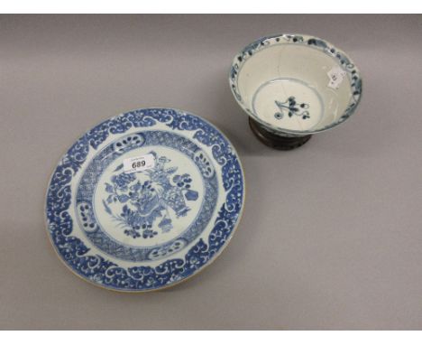 Chinese circular plate blue painted with a vase and duck, together with a provinicial pottery bowl (at fault)   CONDITION REP