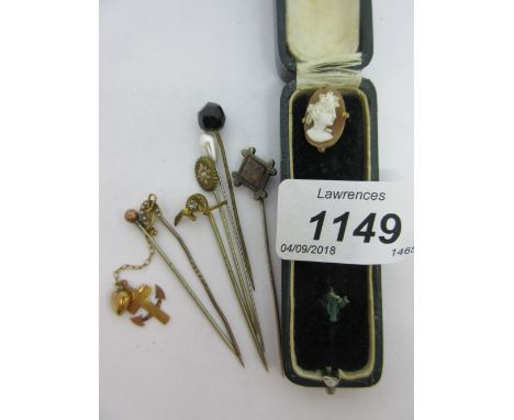 9ct Gold horseshoe stick pin together with a cameo set stick pin in case and six other stick pins