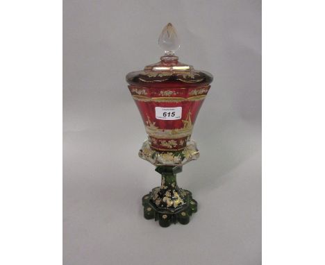 19th Century Bohemian two colour cranberry / green glass pedestal goblet with cover, the octagonal faceted bowl decorated wit