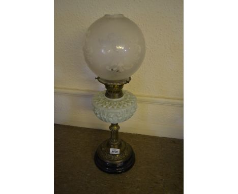 Early 20th Century brass and green opaque glass oil lamp with etched glass shade