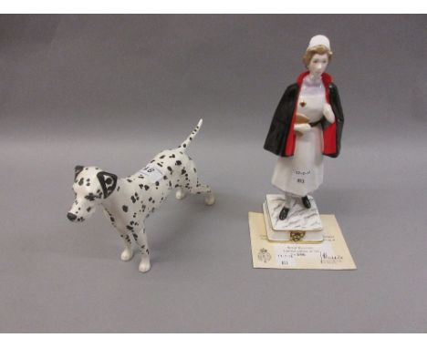 Beswick matt glazed figure of a dalmatian and a Royal Worcester Limited Edition figure, 1960's Guy's Staff Nurse, No. 266 of 