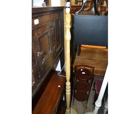 Modern cream painted baluster form standard lamp,  together with a white painted reeded column standard lamp
