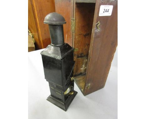 19th Century black toleware oil lamp, inscribed ' The Barton ', housed in a mahogany case