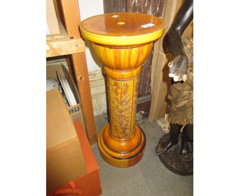 Linthorpe pottery jardiniere stand decorated with an all-over Key pattern design on a mottled yellow ground, impressed mark t