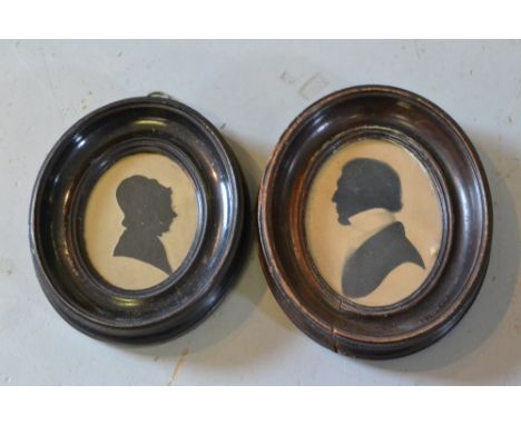 Two 19th Century oval silhouette portrait pictures