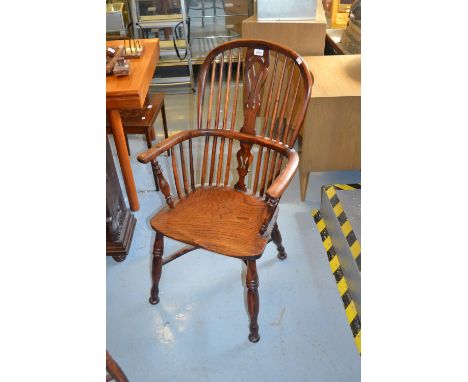18th / 19th Century yew and elm Windsor chair, the tall hoop, stick and pierced splat back above a carved panel seat, turned 