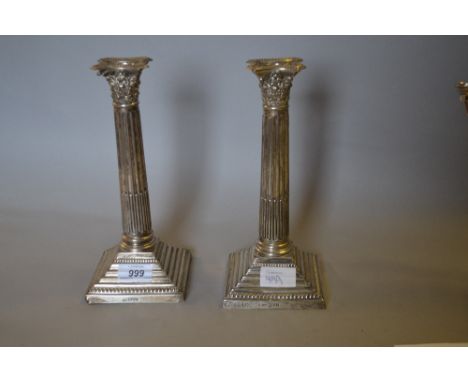 Pair of Edwardian silver Corinthian column candlesticks, Chester, 1906   CONDITION REPORT  No plate loss because this is soli