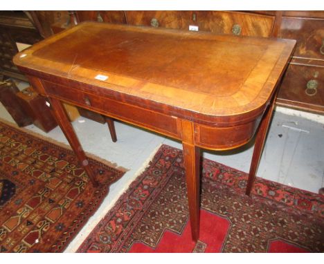 George III mahogany and satinwood crossbanded D-shaped fold-over card table, the line inlaid frieze above square tapering and