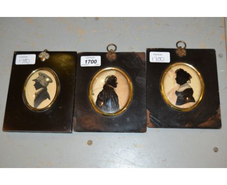 Pair of 19th Century verre eglomise silhouette portraits, a sepia and gilt heightened watercolour silhouette profile portrait