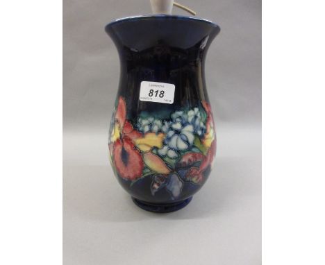Moorcroft floral tube lined pottery table lamp on a blue ground