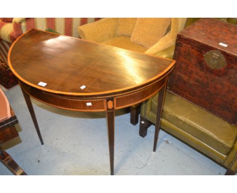 George III mahogany satinwood crossbanded half round card table on square tapering supports