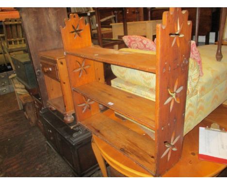 19th Century pine three shelf wall bracket with pierced ends together with a small stripped pine four shelf open bookcase