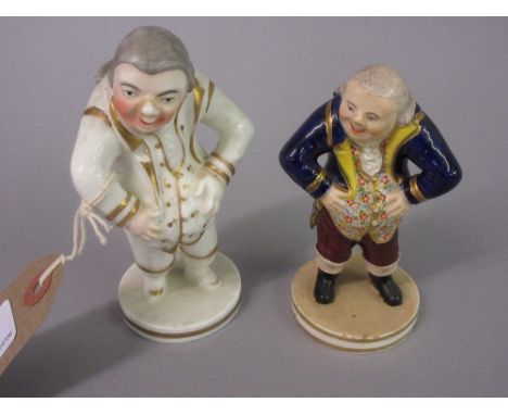 Bloor Derby figure of a portly man wearing a floral waistcoat and blue tail coat, together with another similar figure (unmar
