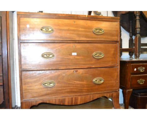Small Regency mahogany and crossbanded straight front chest of three drawers with oval brass handles and splay bracket feet