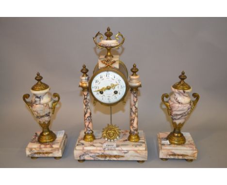 French flecked marble and ormolu clock garniture, the enamel dial with Arabic numerals, with a two train movement striking on