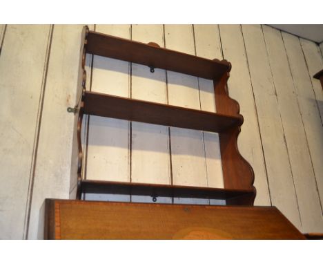 19th Century mahogany three shelf wall bracket together with another similar