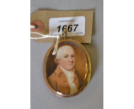 19th Century watercolour portrait miniature of a gentleman wearing a brown coat in a locket mount with hair to the verso, 2in