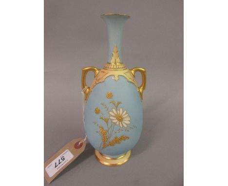 Royal Worcester two handled vase having gilt floral decoration on a pale blue ground CONDITION REPORT Some black blemishes to